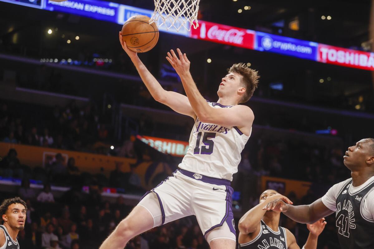 Lakers guard Austin Reaves puts up a shot during the first half against the Spurs on Sunday.