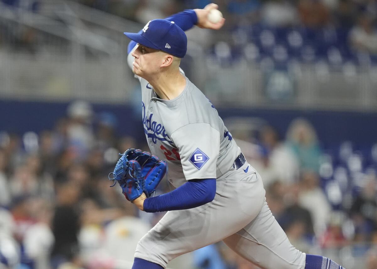 Dodgers pitcher Bobby Miller throws during the first inning of Tuesday's game against the Marlins.