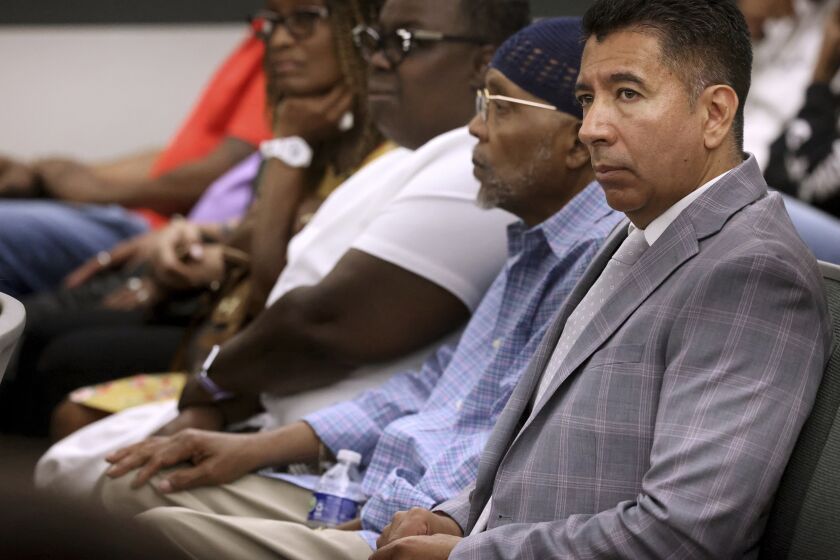Alpine Motel Apartments former owner Adolfo Orozco-Garcia, right, waits to appear in court for a preliminary hearing at the Regional Justice Center in Las Vegas, Thursday, June 8, 2023. Former apartment building owner Orozco-Garcia pleaded not guilty Thursday in Nevada state court to 27 felony manslaughter and negligence charges stemming from a fire that killed six people and injured 13 in December 2019, and became the deadliest residential fire in Las Vegas city history. (K.M. Cannon/Las Vegas Review-Journal via AP)