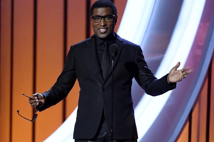 LAS VEGAS, NEVADA - NOVEMBER 17: Kenneth "Babyface" Edmonds presents the Legend Award to Jimmy Jam and Terry Lewis during the 2019 Soul Train Awards presented by BET at the Orleans Arena on November 17, 2019 in Las Vegas, Nevada. (Photo by Ethan Miller/Getty Images for BET)