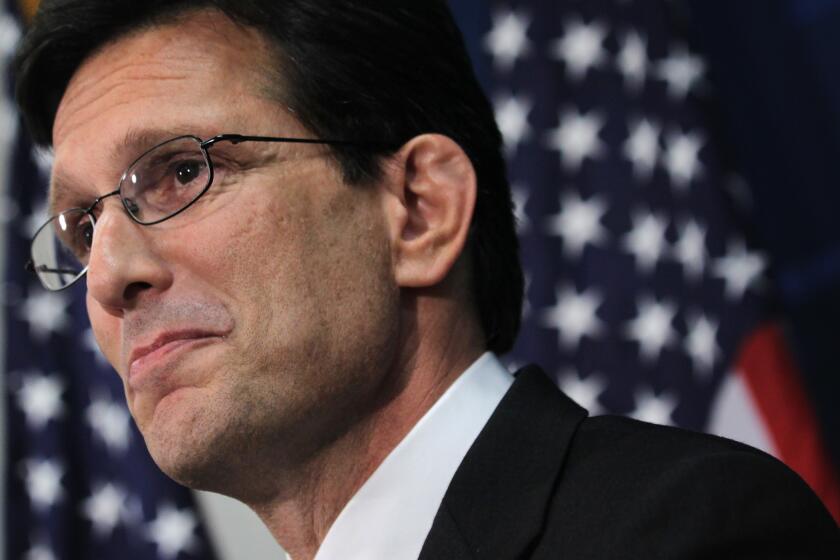 Rep. Eric Cantor (R-Va.) pauses as he speaks during a news conference announcing that he will step down as House majority leader.