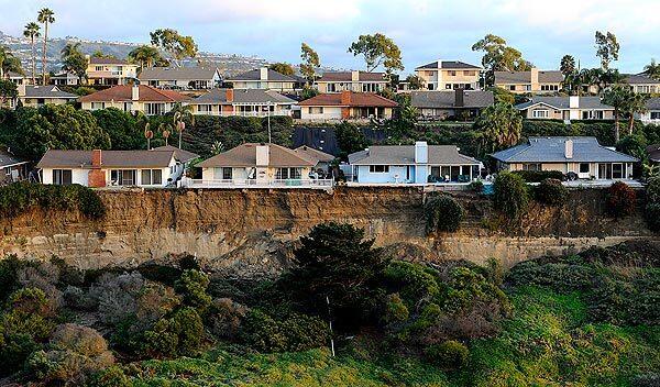 The landslide left San Clemente homes on the brink of a cliff. See full story