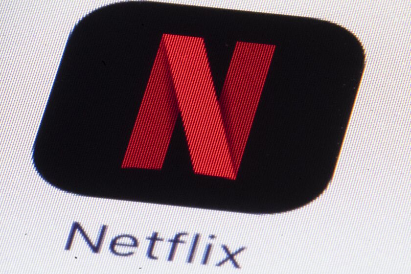 An image of the Netflix logo — a red N in a black box — on a screen