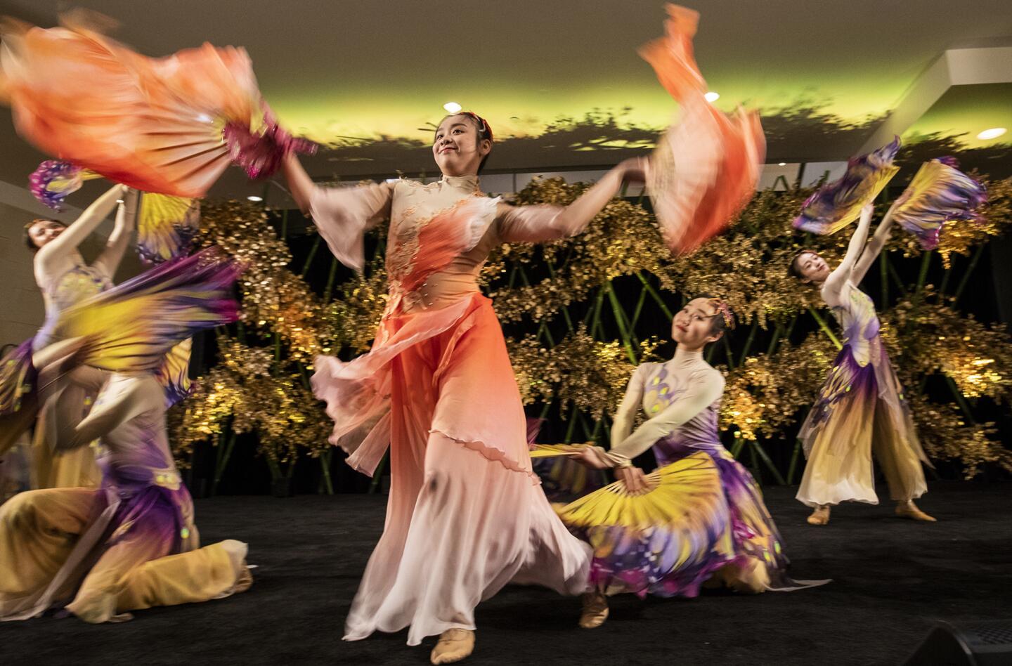 Dancers from the Zhejiang Conservatory of Music perform Thursday during the launch of South Coast Plaza's Lunar New Year celebration, which runs through Feb. 18.