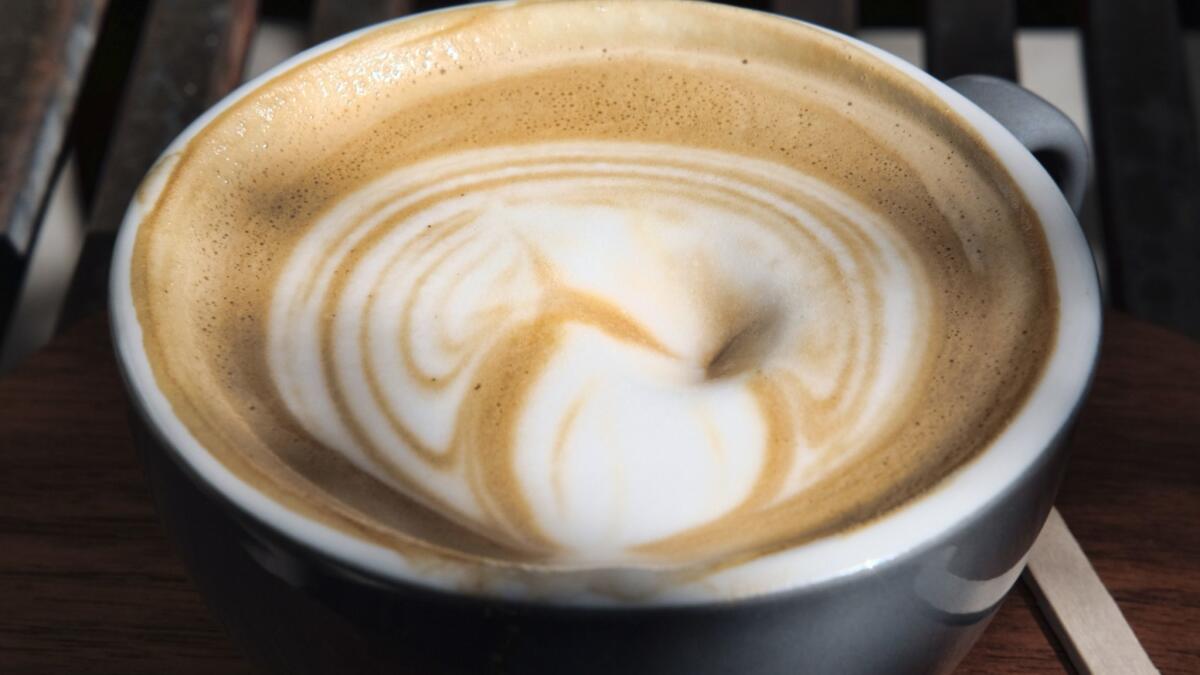 Public health experts are questioning a judge's tentative ruling that coffee should carry a Proposition 65 carcinogen warning. Above, coffee with steamed milk at a Los Angeles Starbucks.