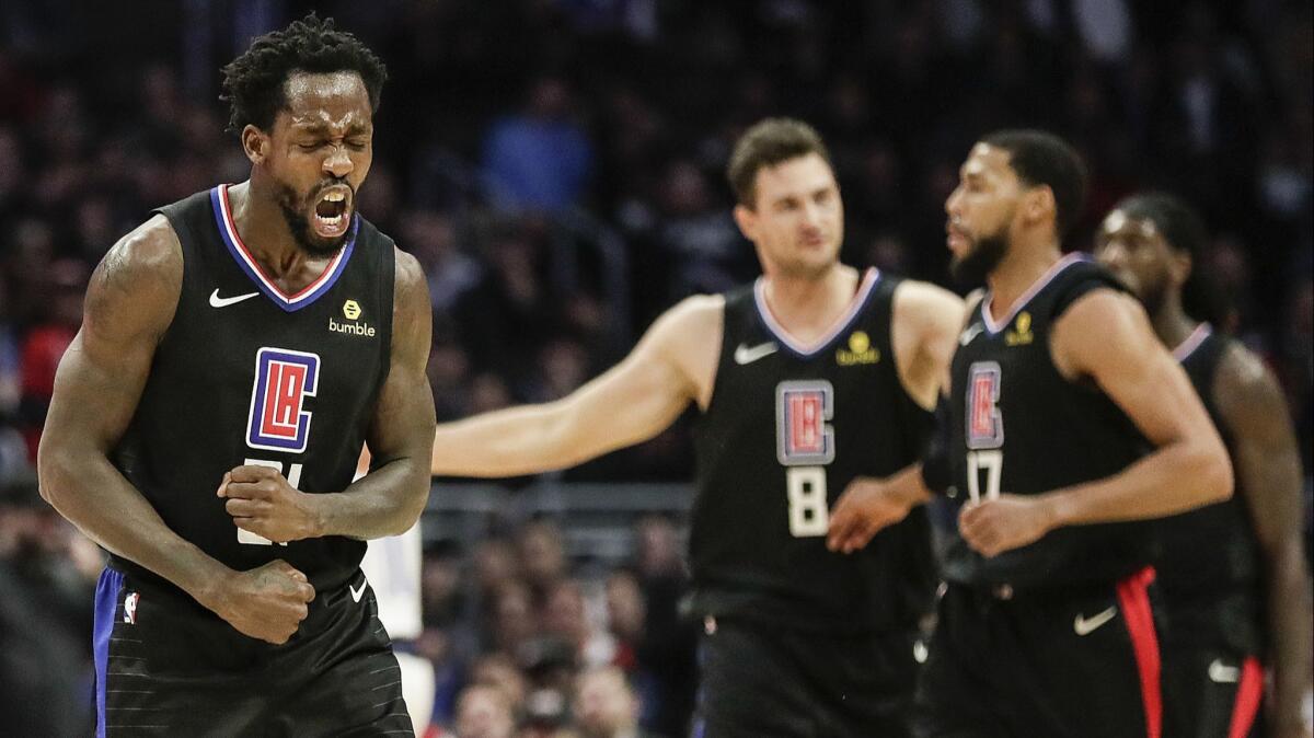 Clippers guard Patrick Beverley reacts after leading a defensive stand against the Dallas Mavericks at Staples Center on Feb. 25, 2019.