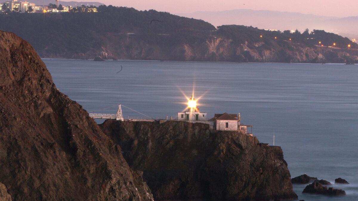 Dusk settles along the Marin Headlands and the Point Bonita Lighthouse in the Golden Gate National Recreation Area.
