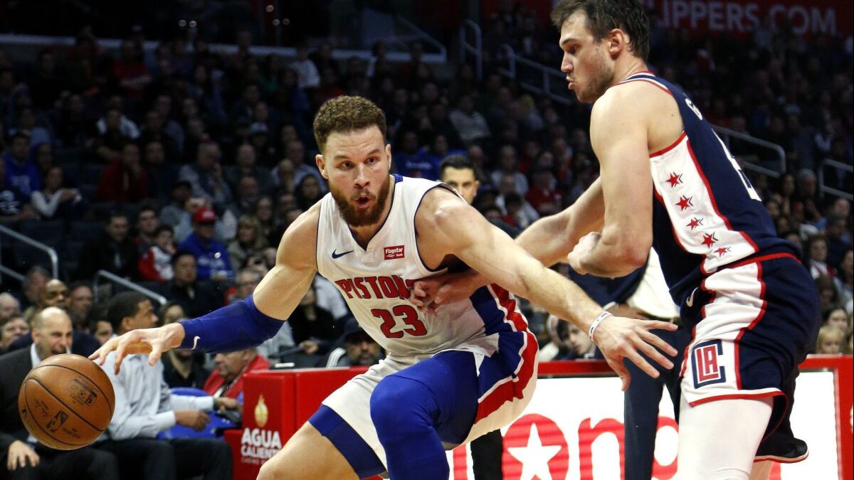 Detroit's Blake Griffin dribbles past the Clippers' Danilo Gallinari in scoring 44 points on Saturday.