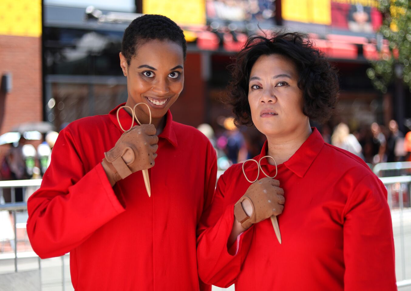 Cheryll del Rosario and Schyler Bradford of San Francisco dressed as Tethered from Jordan Peele's "Us" at Comic-Con International.
