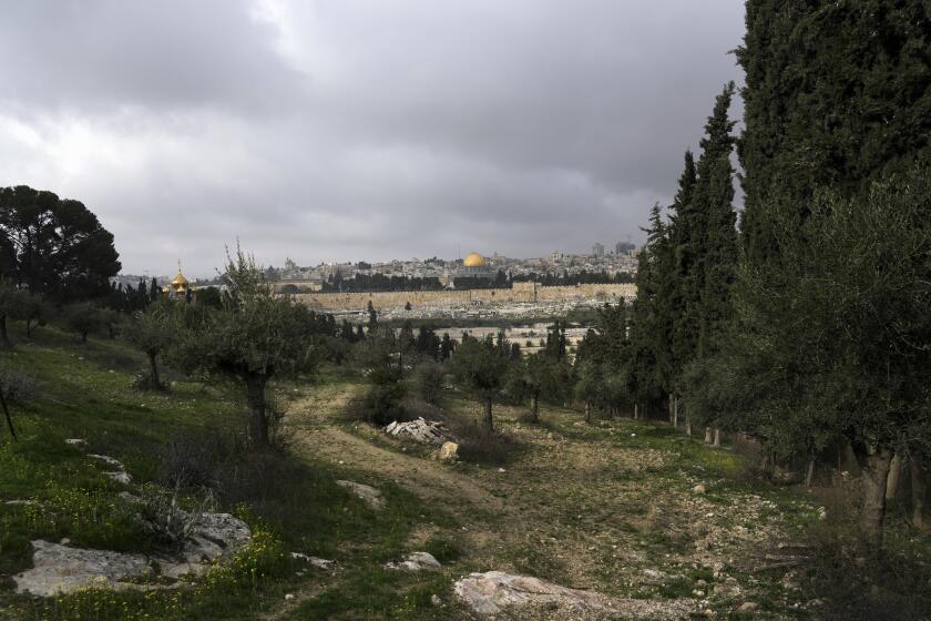 The Old City of Jerusalem is seen from the Mount of Olives, in East Jerusalem, Monday, Feb. 21, 2022. Israel's Nature and Parks Authority says it is backing down from a plan to encompass Christian holy sites on Jerusalem's Mount of Olives in a national park after vociferous outcry from major churches. (AP Photo/Mahmoud Illean)