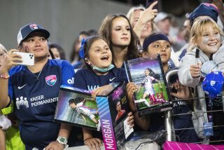 San Diego, CA - September 17: Fans beg to get an autograph from San Diego Wave forward Alex Morgan after their game against Angel City at Snapdragon Stadium on Saturday, Sept. 17, 2022 in San Diego, CA. (Meg McLaughlin / The San Diego Union-Tribune)