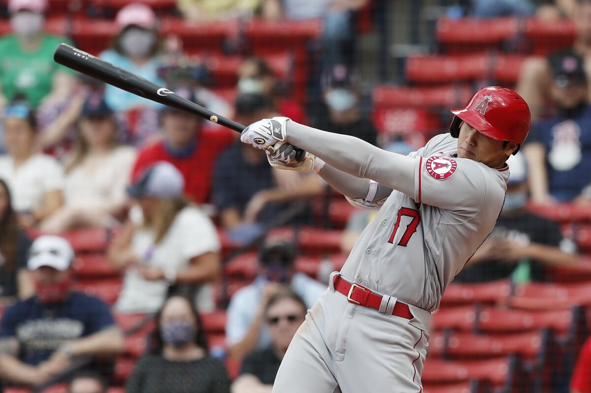 Shohei Ohtani follows through on a hit against the Boston Red Sox on May 16.