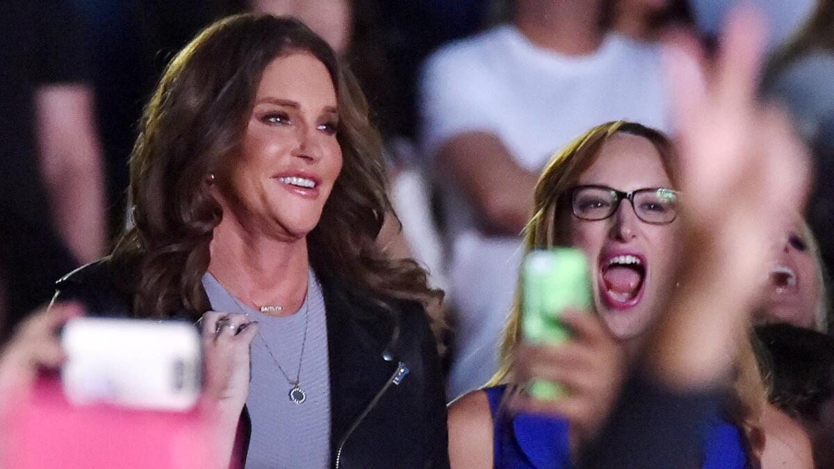Caitlyn Jenner, left, and her friend Jen Richards attend a concert at the Greek Theatre on July 24.