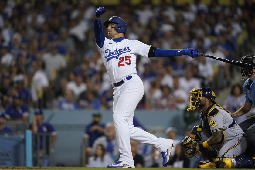 Los Angeles Dodgers designated hitter Trayce Thompson (25) hits a home run during the second inning of a baseball game against the Milwaukee Brewers in Los Angeles, Tuesday, Aug. 23, 2022. Joey Gallo and Cody Bellinger also scored. (AP Photo/Ashley Landis)