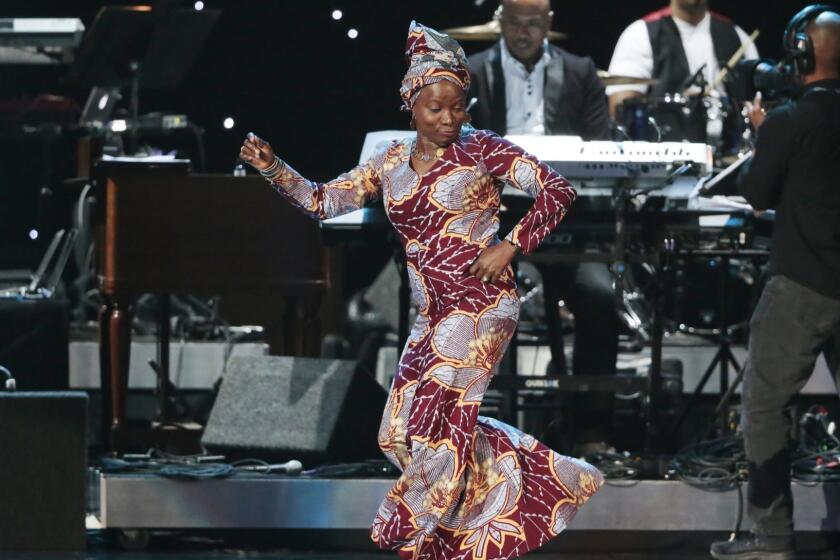 LOS ANGELES, CA - February 8, 2015 Winner of the Best World Music album Angelique Kidjo at the pre-telecast show for the 57th Annual GRAMMY(R) Awards at Nokia Theater L.A. Live in Los Angeles, CA. Sunday, February 8, 2015. (Robert Gauthier / Los Angeles Times)