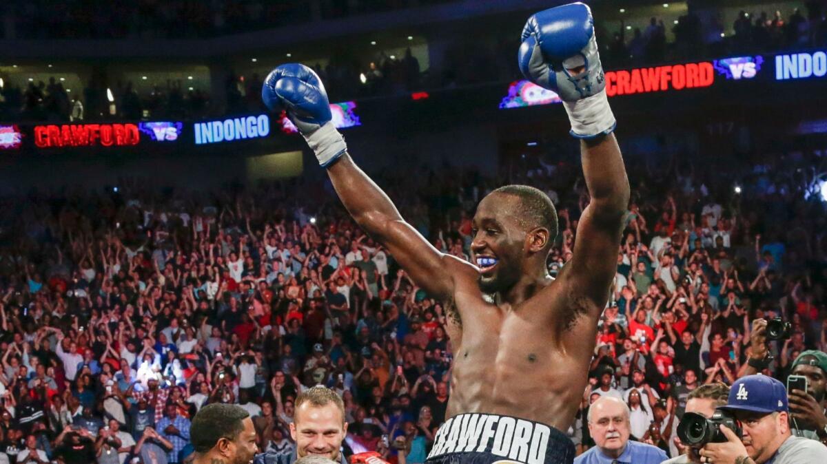 Terence Crawford celebrates his victory over Julius Indongo on Aug. 19 in Lincoln, Neb.