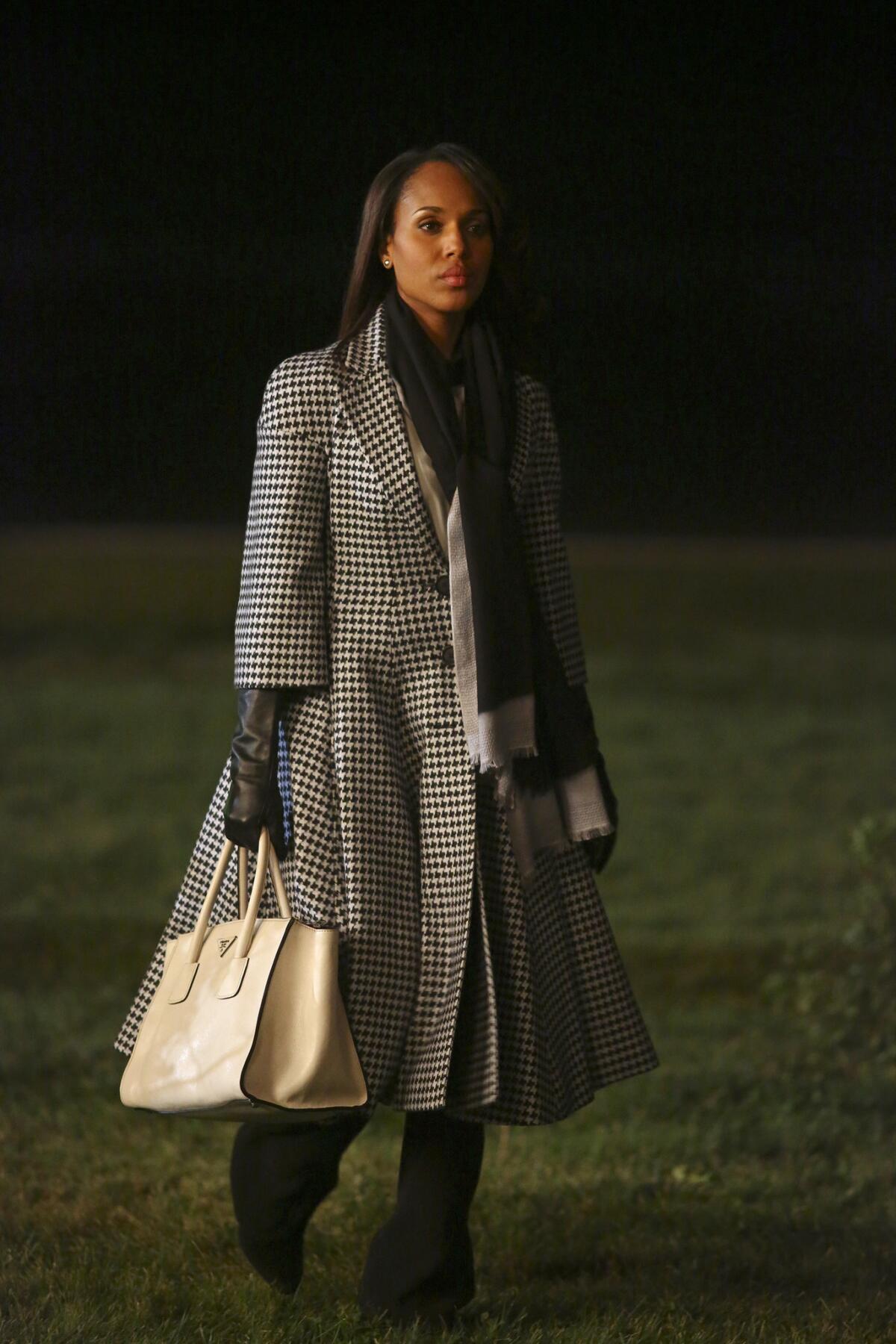 Season 3 episode "Vermont is for Lovers, Too" features Olivia Pope wearing a black-and-white houndstooth coat by Christian Dior and Armani pants. (She's also carrying her signature Prada handbag.)