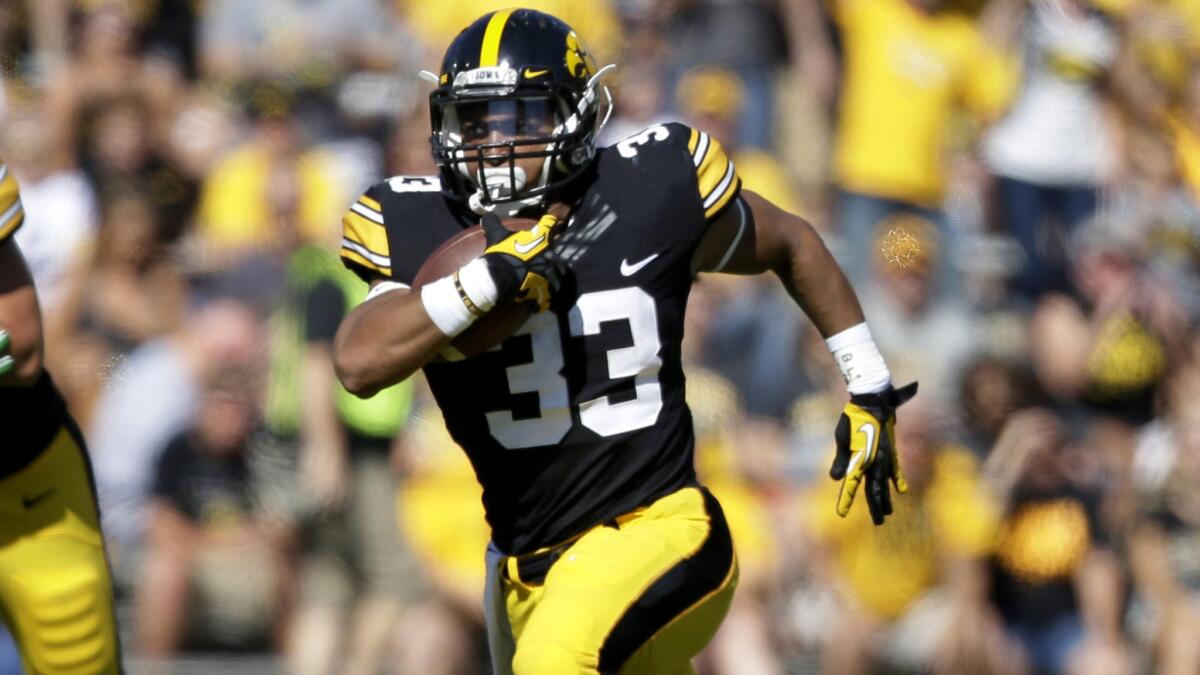 Running back Jordan Canzeri and Iowa are two wins from a 13-0 season, Big Ten title and a likely spot in the College Football Playoff. Next up: Nebraska.