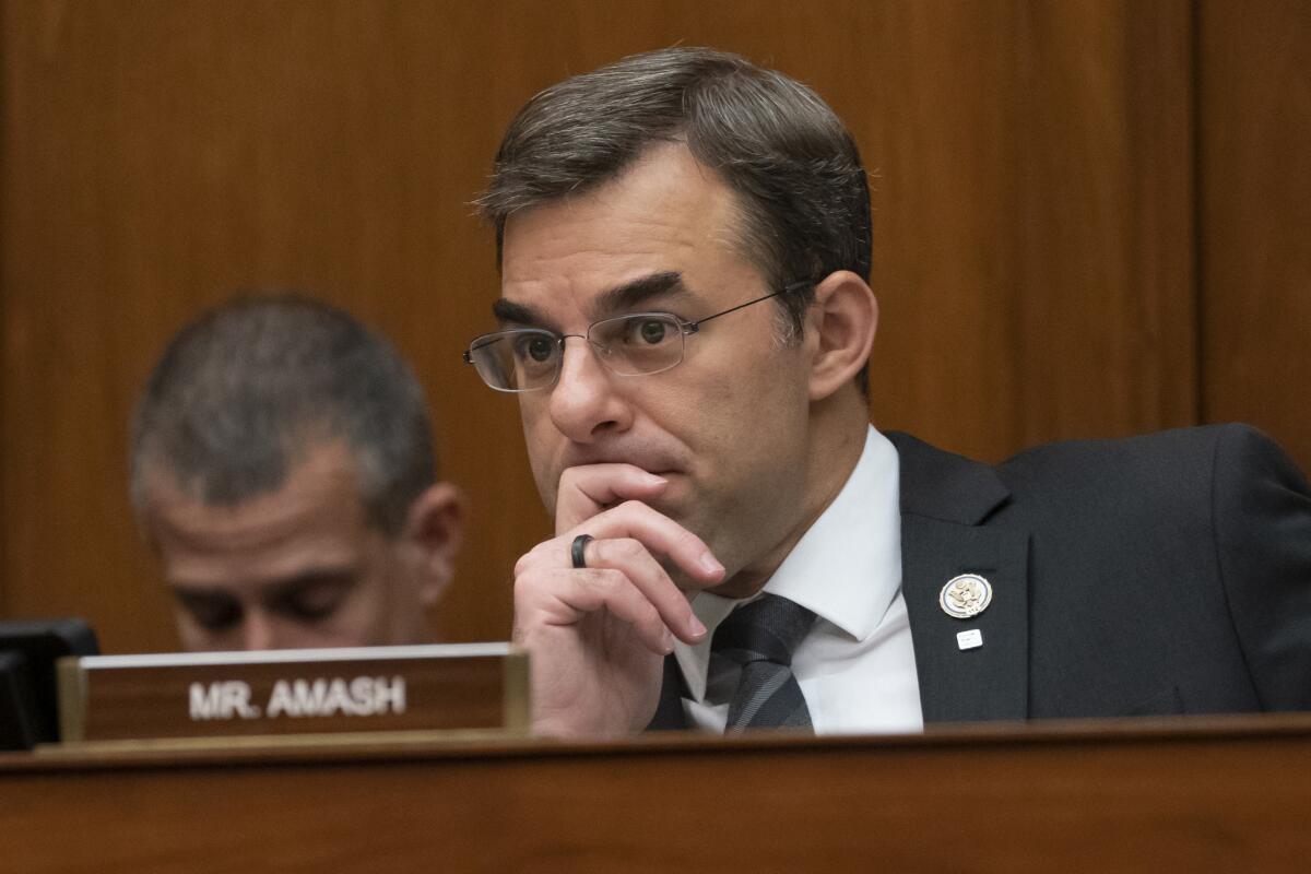Michigan Rep. Justin Amash listens in June 2019 to debate on the House Oversight and Reform Committee on Capitol Hill in Washington.