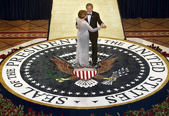 President George W. and First Lady Laura Bush at the 2005 Commander in Chief's Inaugural Ball at the National Building Museum in Washington.