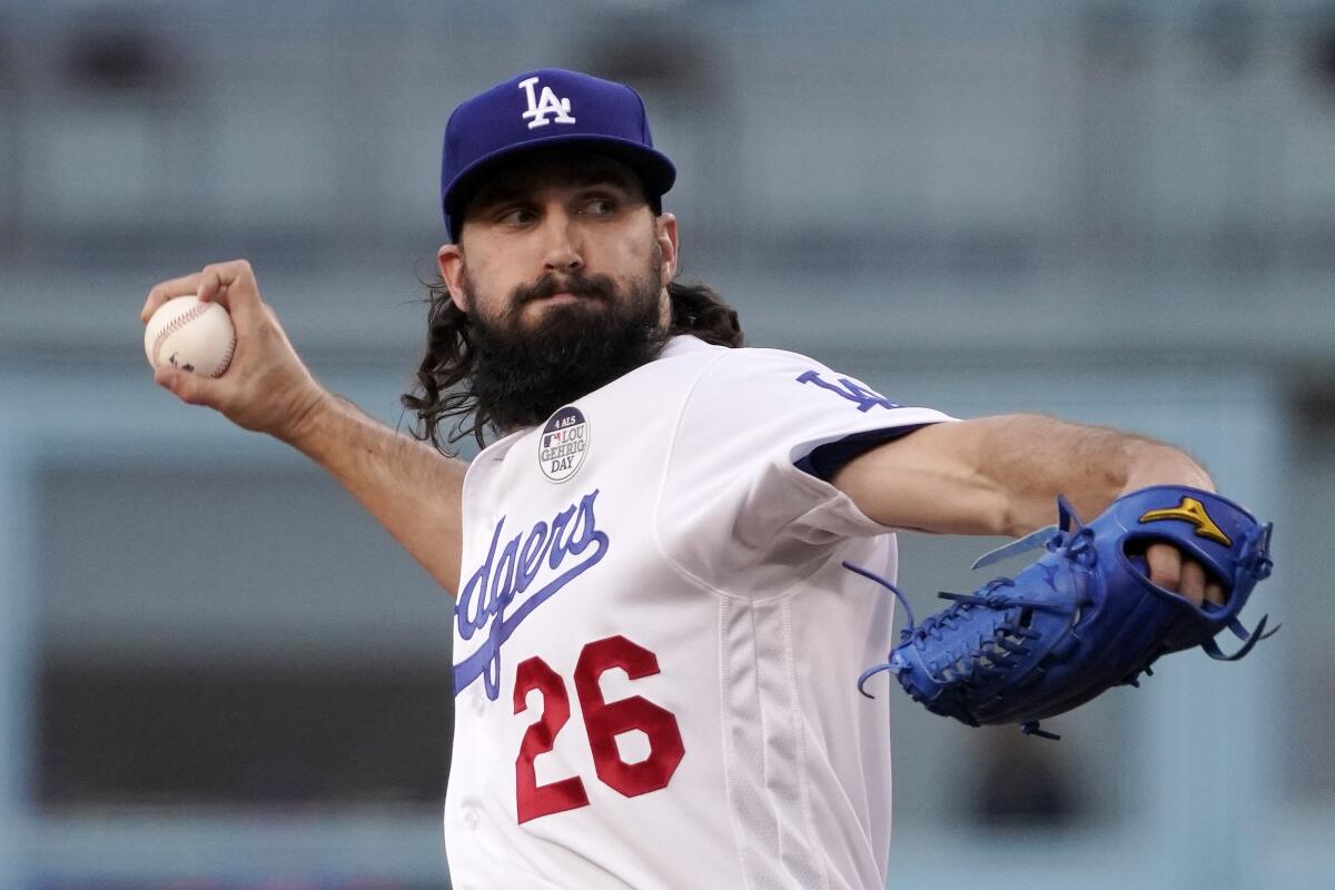 Dodgers pitcher Tony Gonsolin delivers a pitch during a game.