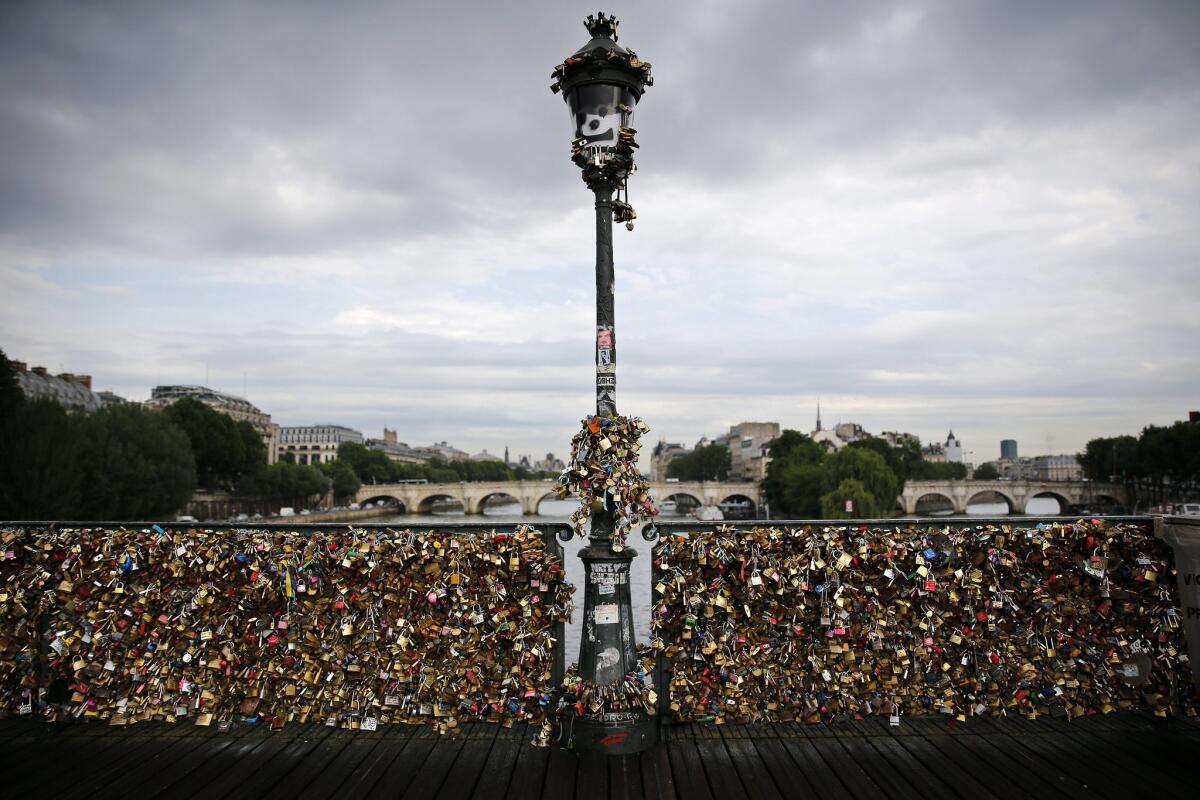 Thousands of love locks on the railings of the Pont des Arts in Paris.