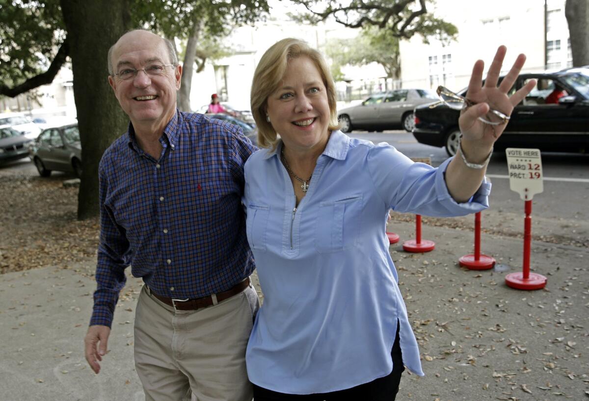 Louisiana Sen. Mary Landrieu arrives with her husband, Frank Snellings, to vote in her runoff election against Rep. Bill Cassidy. Cassidy, a Republican, was expected to defeat the Democratic incumbent.