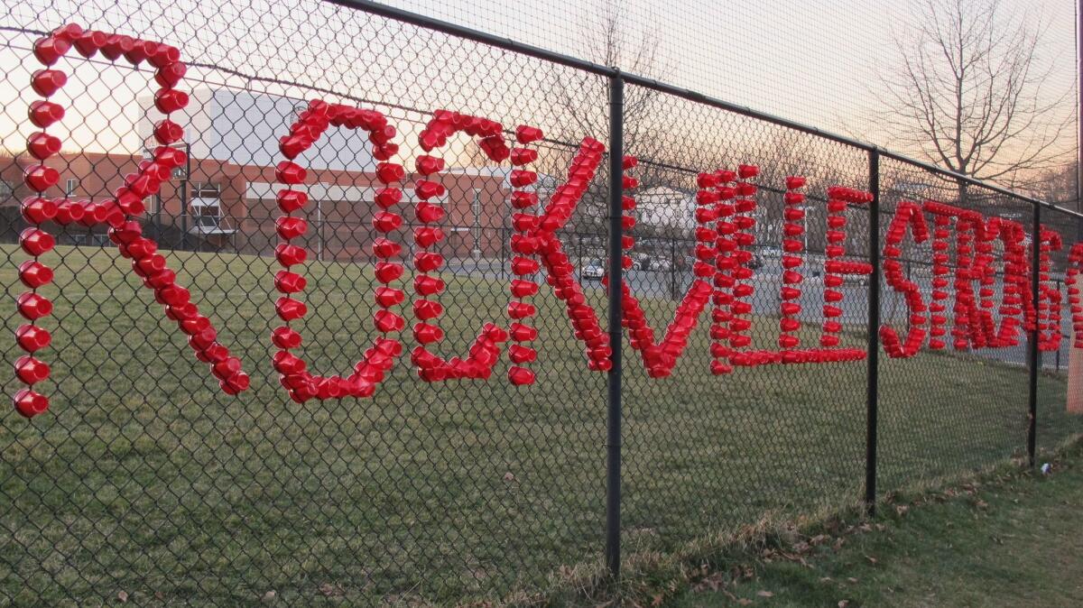 Plastic cups spell out "Rockville Strong" at Rockville High School in Maryland on March 23, 2017. The school was thrust into the national immigration debate after a 14-year-old said she was raped in a bathroom by other students who were said to be in the country illegally.