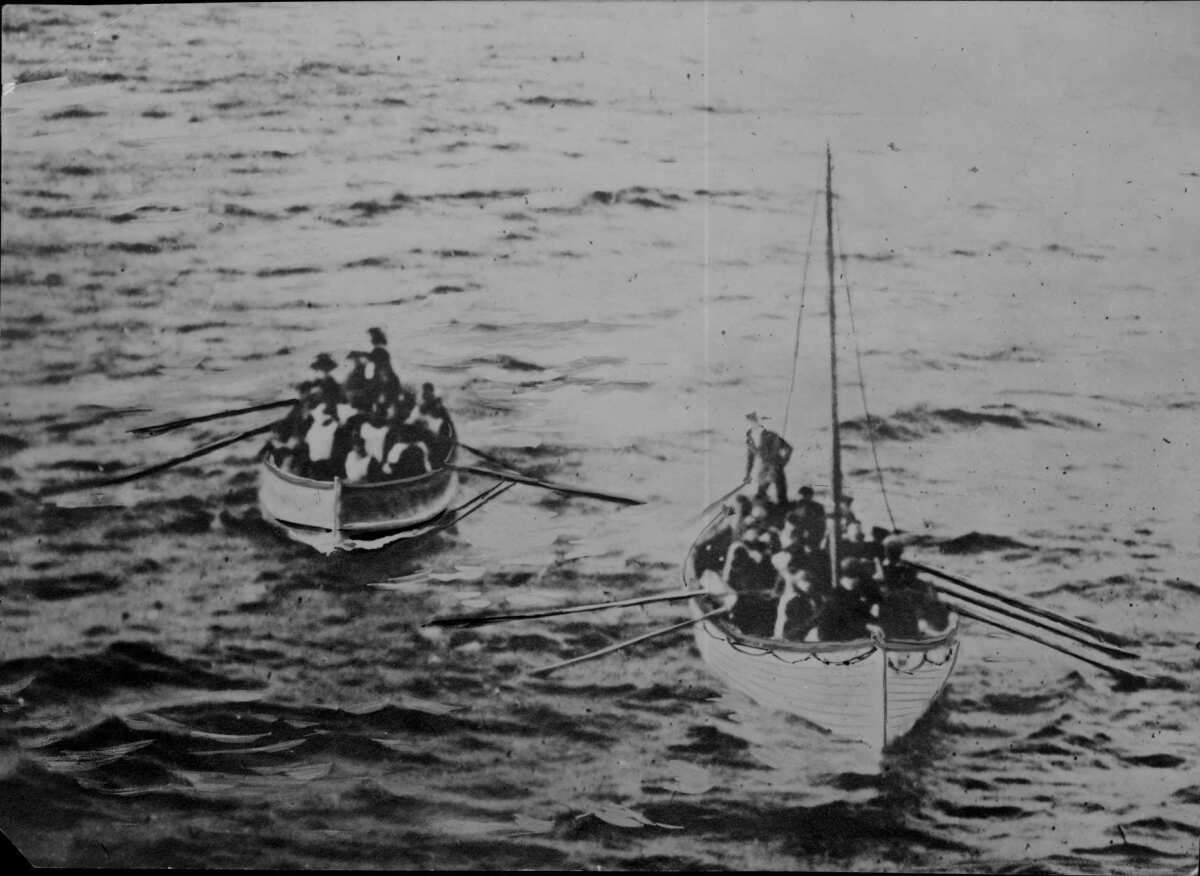 Lifeboats carry survivors of the real-life sinking of the the Titanic. (N.Y. Herald Syndicate)