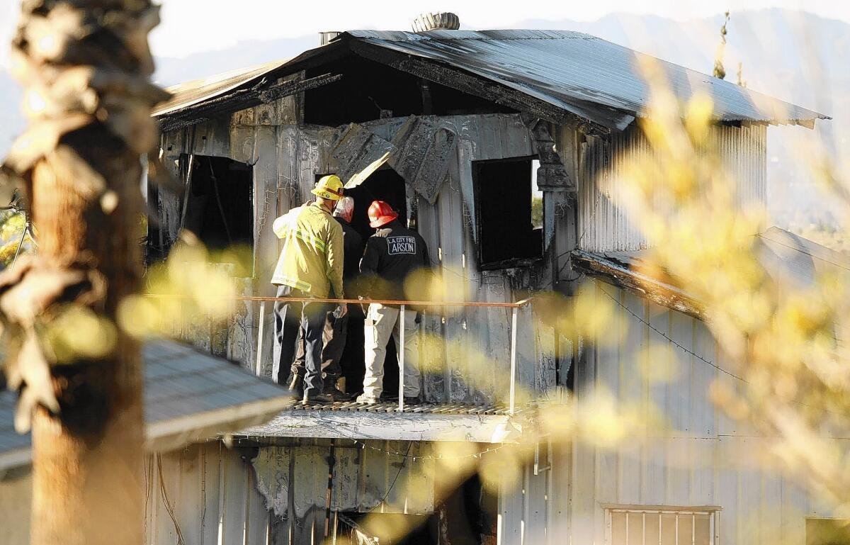 A family of four died after this converted barn in Sylmar caught fire in January. The owner has been charged with failure to install smoke detectors and other criminal misdemeanors.