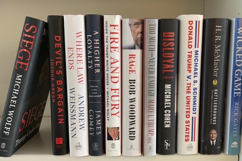 A collection of books about President Donald Trump, from left, "Siege" by Michael Wolff, "Devil's Bargain" by Joshua Green, "Where Law Ends" by Andrew Weissmann, "A Higher Loyalty: Truth, Lies, and Leadership" by James Comey, "Fire and Fury: Inside the Trump White House" by Michael Wolff, "Rage" by Bob Woodward, "Too Much and Never Enough" by Mary L. Trump, "Disloyal" by Michael Cohen, "Donald Trump V. The United States" by Michael S. Schmidt, "Battlegrounds: The Fight to Defend the Free World" by H. R. McMaster and "Wicked Game" by Rick Gates appear on a shelf in Westchester County, N.Y. on Monday, Nov. 9, 2020. One of publishing's most thriving genres of the past four years, books Trump, is not going to end when he leaves office. In 2021 look for waves of releases about the Trump administration and about the president's loss to Democratic candidate Joe Biden. (AP Photo)