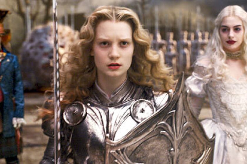 Burton and company have taken special care to provide pictures of Alice (Mia Wasikowska) as a warrior princess in full Joan of Arc armor as a female empowerment icon for the girls in the audience.