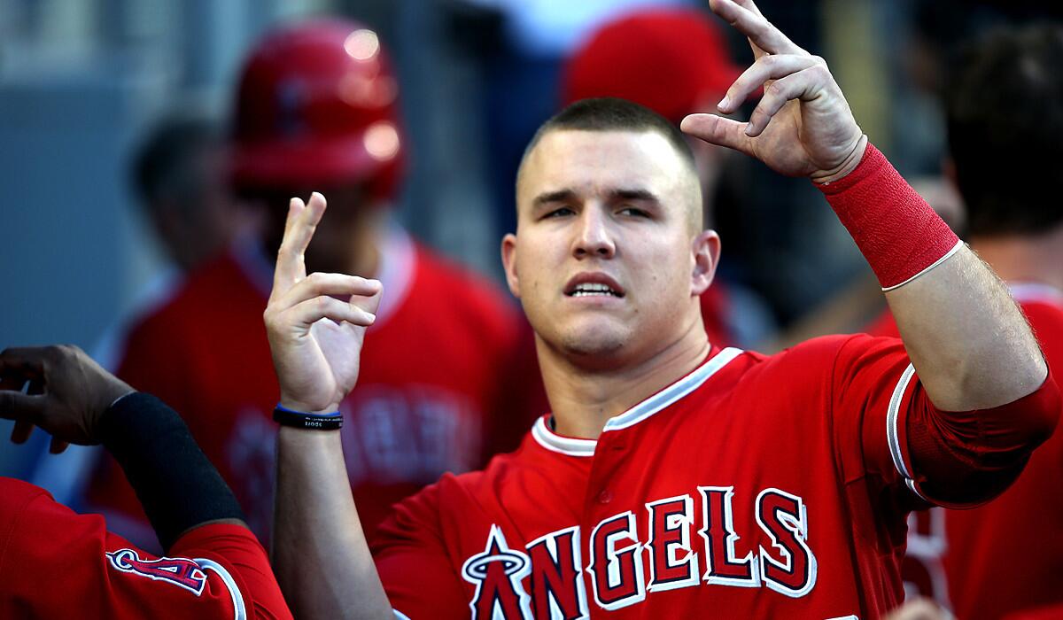 Angels center fielder Mike Trout, 23, became the third-youngest winner of the American League MVP.