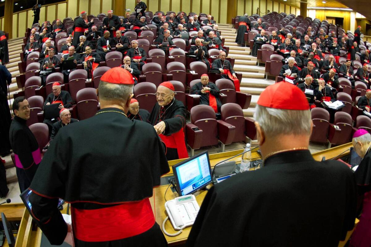 Cardinals Tarcisio Bertone, left, and Angelo Sodano attend opening talks at the Vatican ahead of a conclave at which cardinals will elect a successor to Pope Benedict XVI.