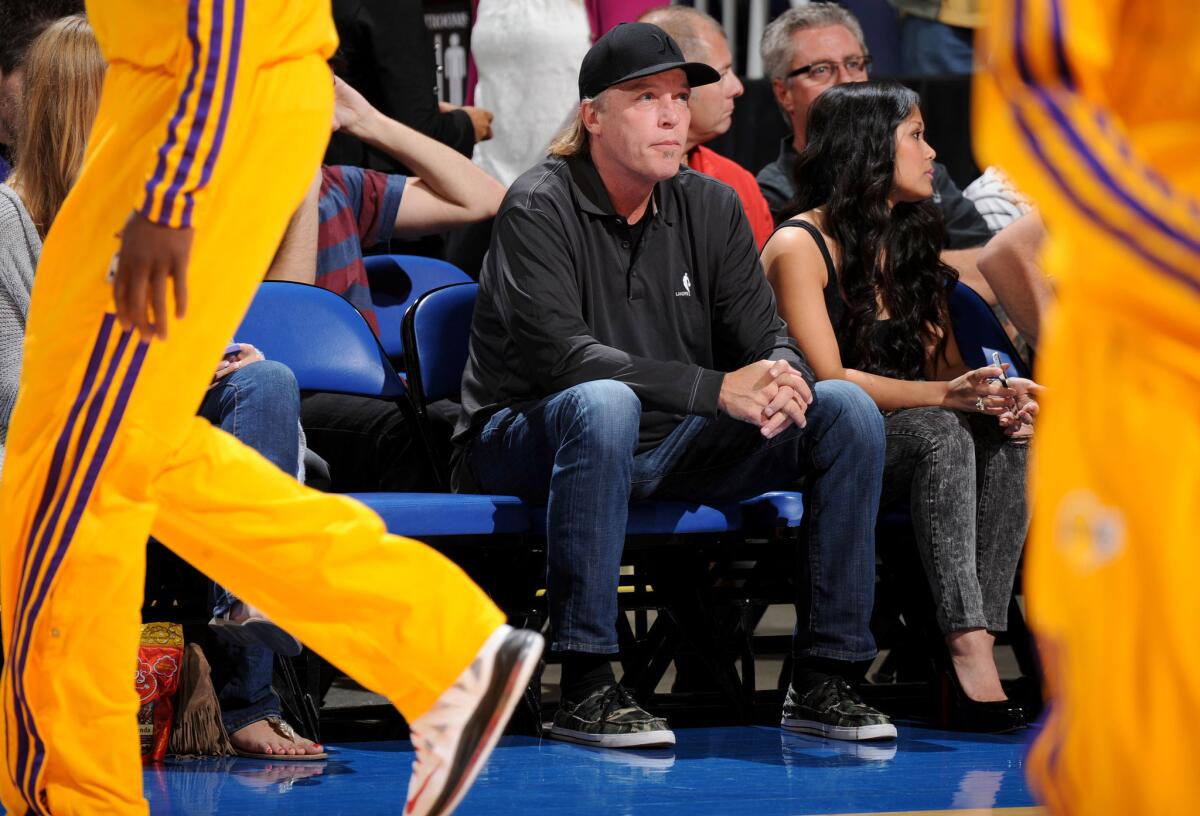 Lakers Owner and Executive Vice President Jim Buss says he sees his team back on top in the next five years despite failed attempts to lure big-time free agents like Carmelo Anthony and LeBron James to Los Angeles last summer.