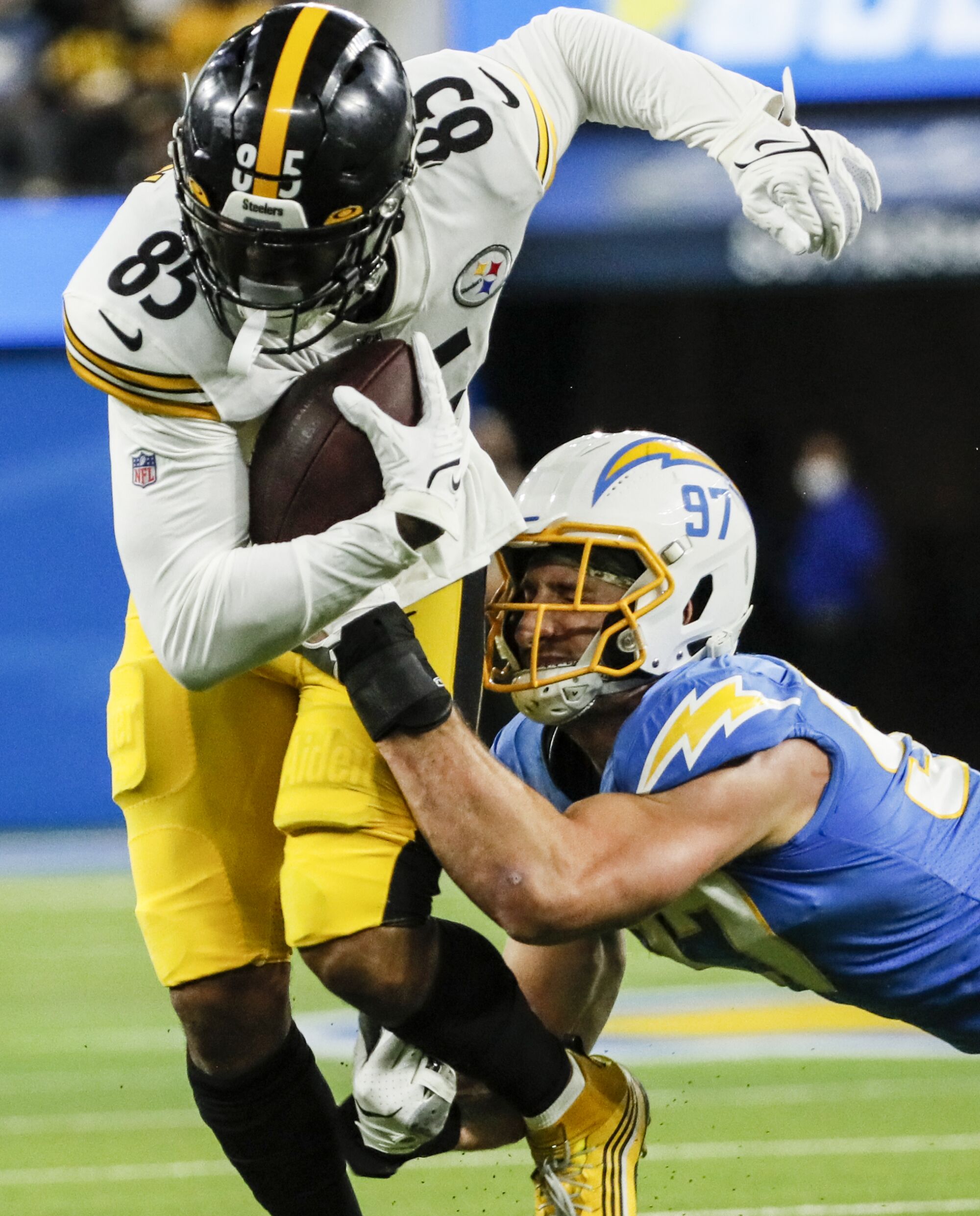 Chargers defensive end Joey Bosa tackles Pittsburgh Steelers tight end Eric Ebron.