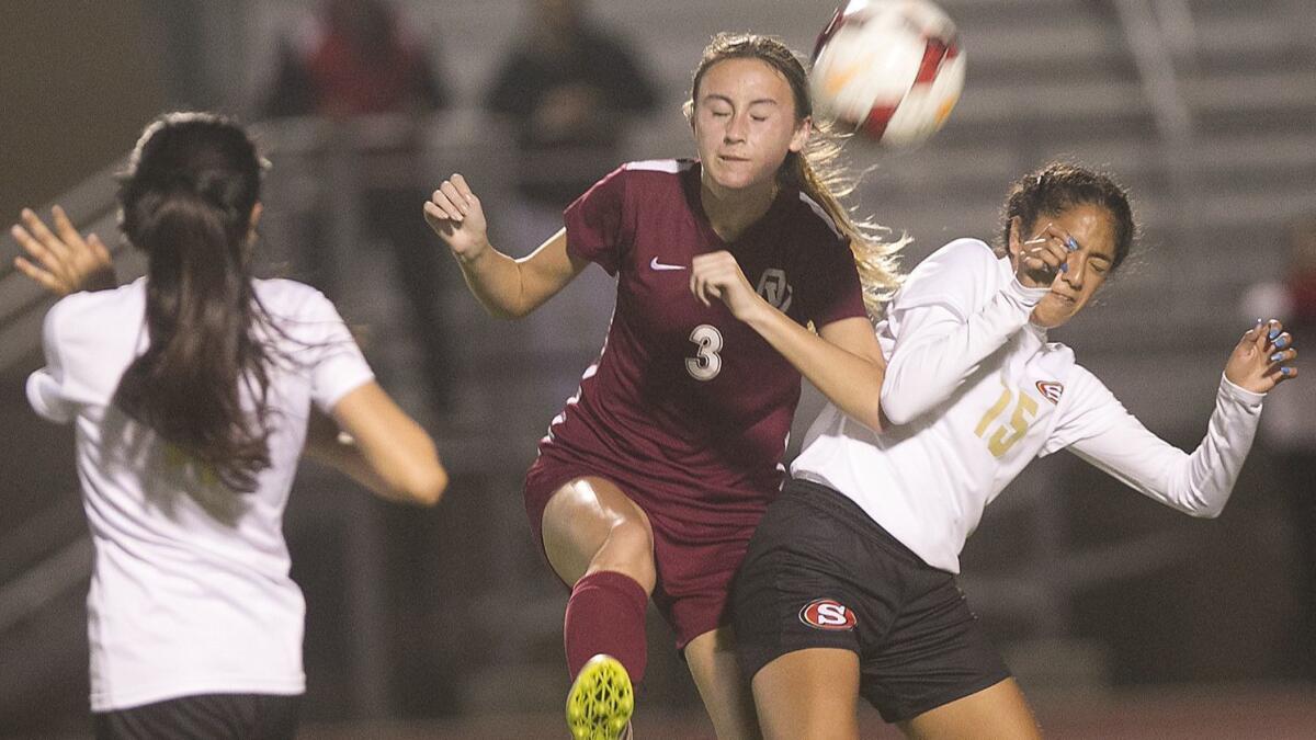 Taylor Voegelie (3), shown challenging for a ball on Feb. 9, 2017, was a first-team All-Golden West League selection for the Ocean View High girls' soccer.