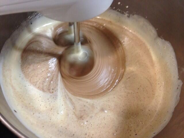 3: Incorporating the melted chocolate with the eggs