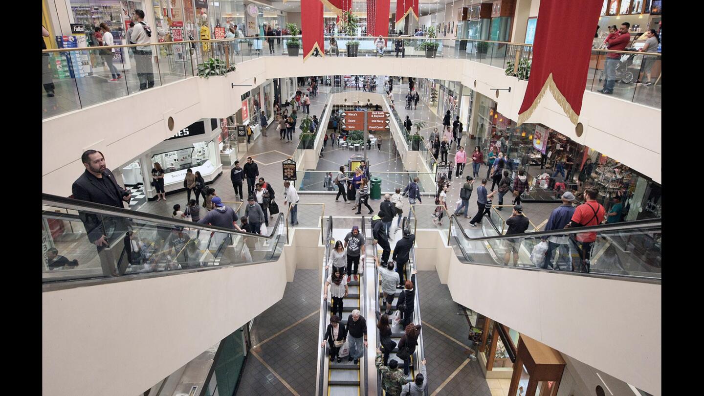 Black Friday shoppers look for deals at the Burbank Town Center on Friday, November 27, 2015.