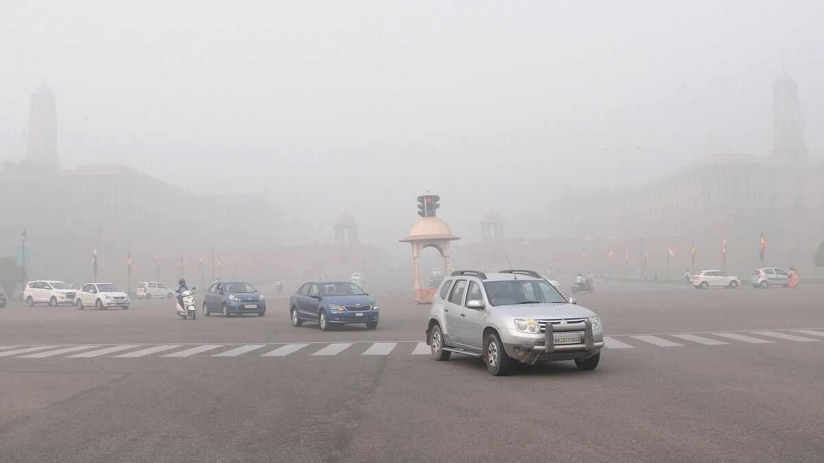 Rajpath Avenue is engulfed in smog near President House, the official residence of the Indian president in New Delhi.
