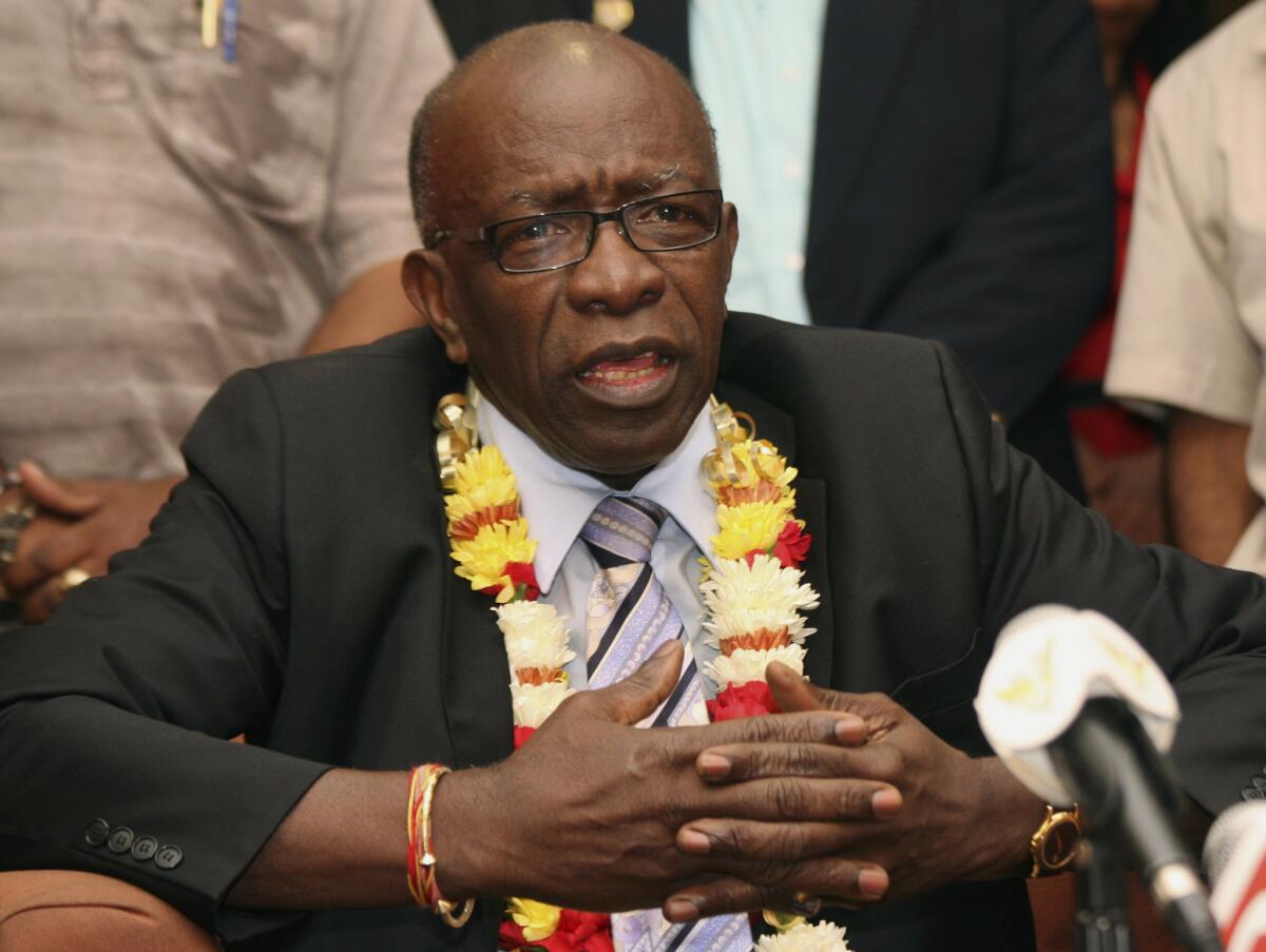 Jack Warner was one of six men with ties to FIFA added to Interpol's most wanted list on Wednesday.