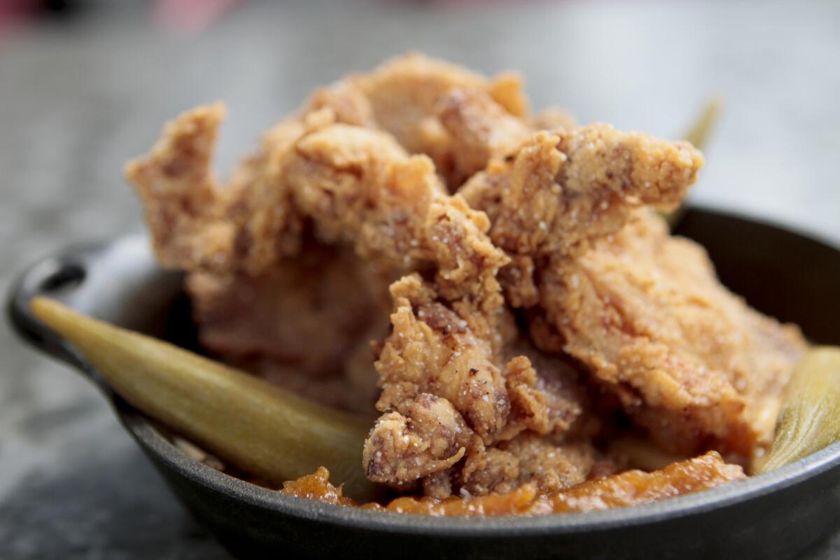 At Plan Check Kitchen and Bar, kids can order a smaller version of the restaurant's popular fried chicken with yams and milk gravy.