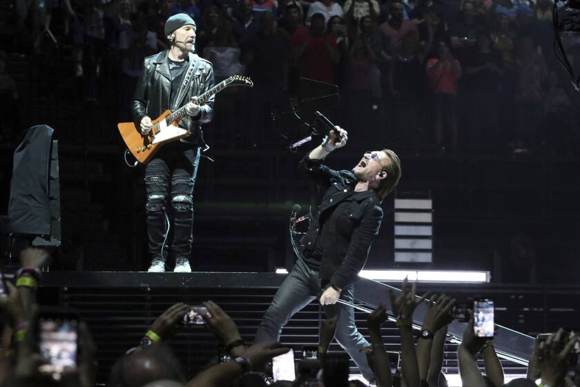 Bono and The Edge of the band U2 perform onstage