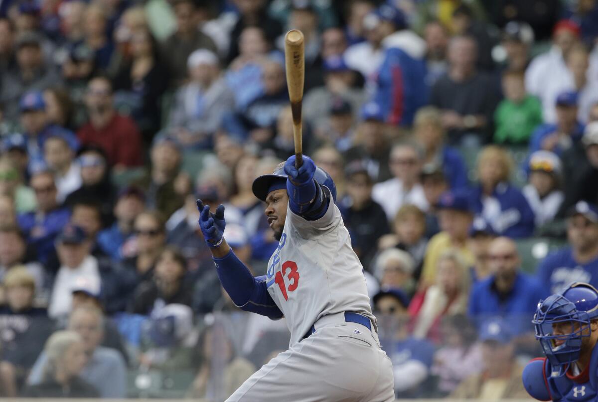 Hanley Ramirez hits a one-run double against the Chicago Cubs on Sunday.