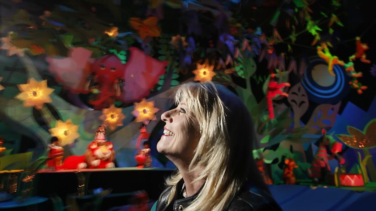 Kim Irvine on It's a Small World in 2009, which at the time was the subject of fan backlash for the addition of Disney characters.