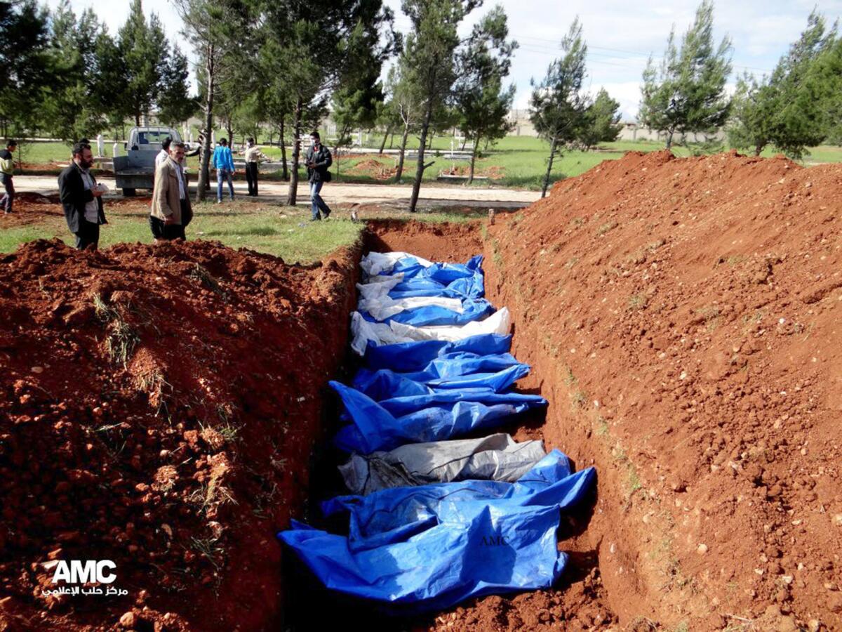 An image provided by opposition activists in April shows a mass grave said to contain the bodies of people killed by Syrian army snipers in Aleppo.