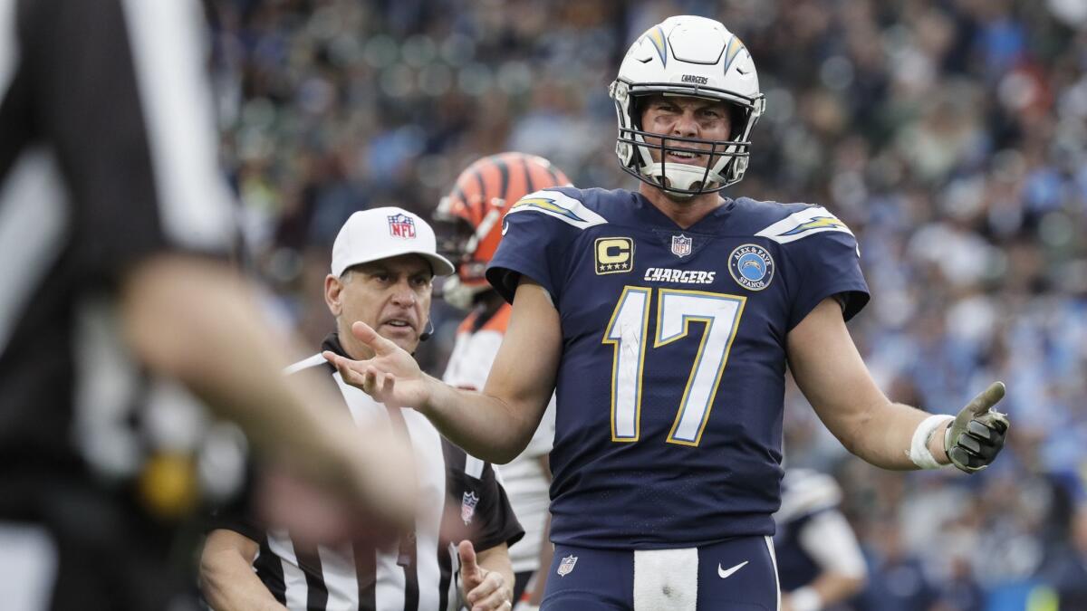 Chargers quarterback Philip Rivers complains to an official after throwing an incomplete pass to Keenan Allen, arguing that pass interference should've been called late in the fourth quarter at StubHub Center on Dec. 9.