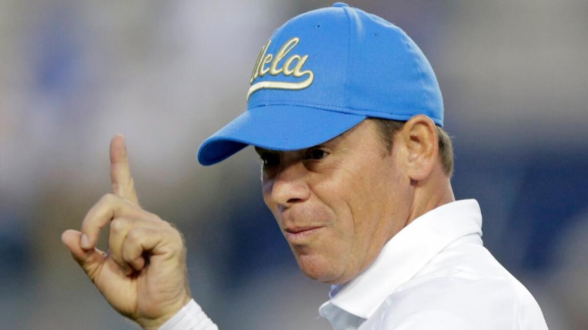 UCLA Coach Jim Mora gestures before the start of a game against Brigham Young on Sept. 17.