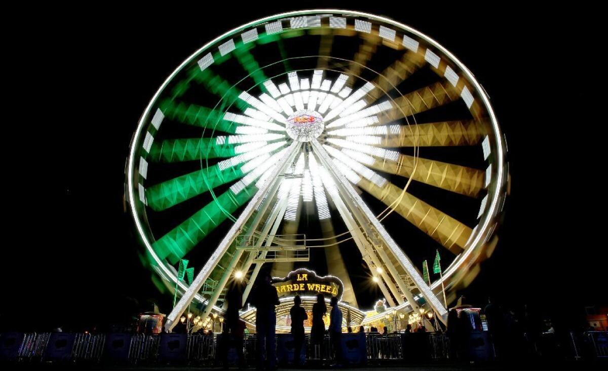 The LaGrande Wheel Ferris Wheel lights up the night at Rock in Rio in Las Vegas on Friday.