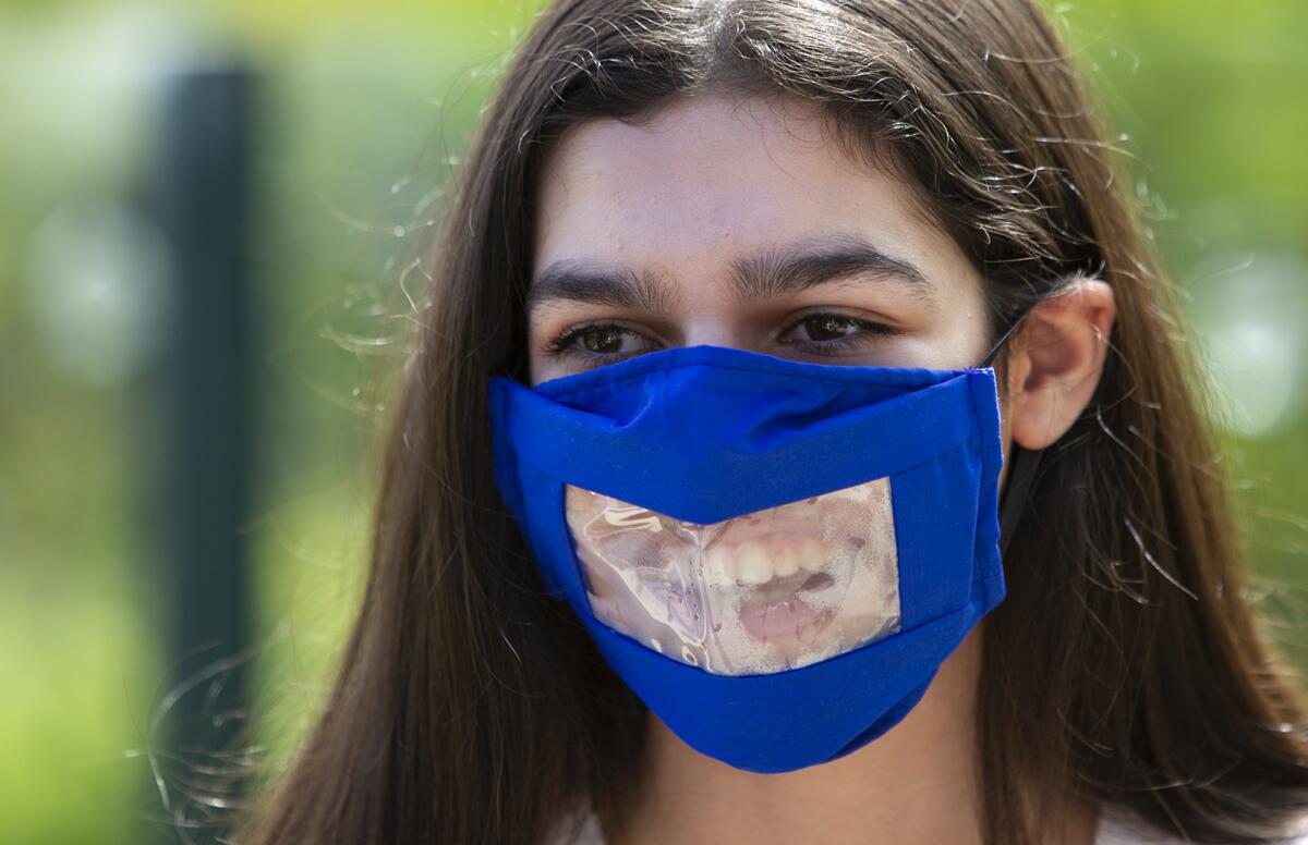 Isabelle Dastgheib, 15, wears a mask designed for the deaf community.